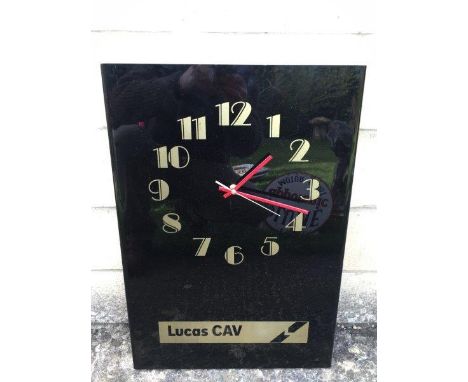 A Lucas CAV Art Deco style black perspex showroom clock, 16 x 23 1/2"