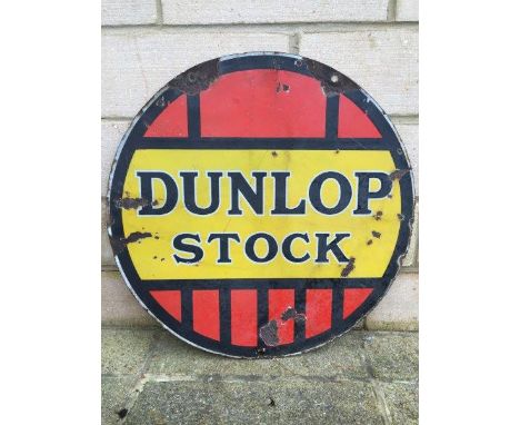 A Dunlop Stock circular double sided hanging enamel sign, 24" diameter.