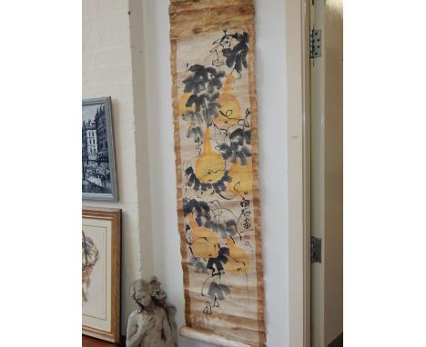 A Chinese scroll, decorated with gourds and foliage.