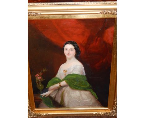 An early 20th century portrait of a lady dressed in white with green shawl and Edwardian brooch, oil on canvas. 53 x 38cm