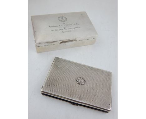 A George V rectangular silver cigarette case, Richard Burbridge for Harrods Ltd, Birmingham 1932, the engine turned body with