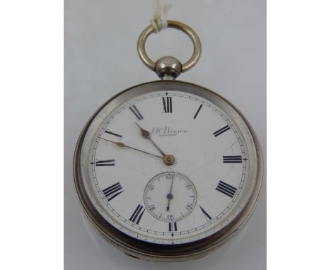 A silver J. W. Benson open faced pocket watch, the enamel dial with Roman numerals, subsidiary seconds dial at six, round hin