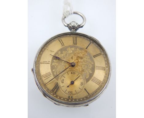 A white metal open face pocket watch,10 jewel movement, cylinder escapement, the floral engraved gilt dial with Roman numeral