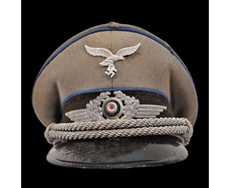 Rare WWII Nazi German officer of the Luftwaffe medical service visor cap. This authentic piece of World War II German militar