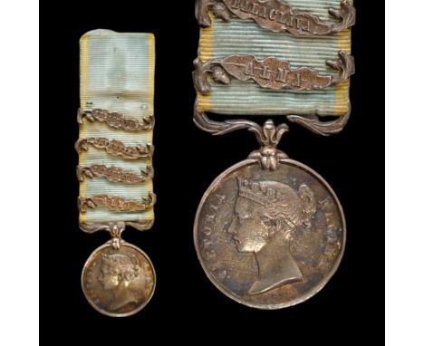 The Crimea Medal, 18mm miniature in silver, is a specimen medal with four clasps (Alma, Balaklava, Inkermann, Sebastopol), th