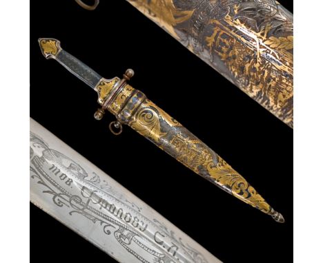A Luxury Presentation Russian Dagger, Cooperative "Metallist" Zlatoust, 1928. A straight double-edged blade, decorated with a
