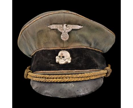 Extra Rare WWII Nazi German SS General's Officers visor cap. Has Reichsadler and Totenkopf cap badges. The body is a very fin