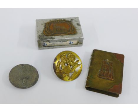 Mixed lot to include an early 20th century brass lighter, match box cover, double headed eagle gilt metal button and a German