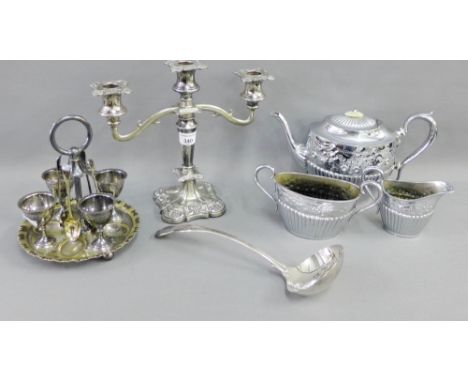 Quantity of Epns wares to include an egg cruet set, three piece teaset and a soup ladle, together with a candelabra, (a large