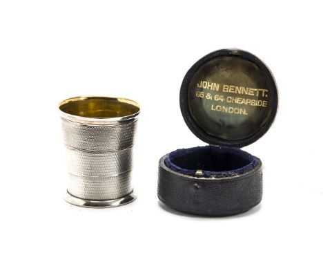 A good Victorian silver hunting beaker by John Bennett, the three section collapsible cup marked London 1868 and F. West, in 