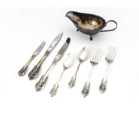 A vintage white metal sauce boat, marked Sterling Silver to underside, together with six forks, six teaspoons, three knives a