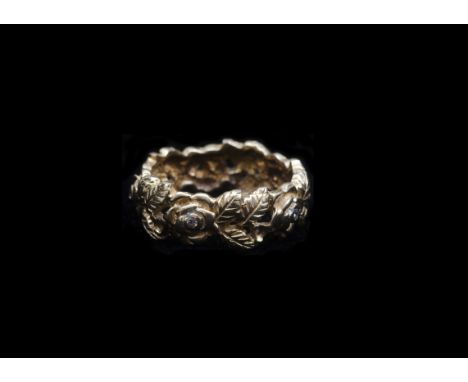 A commemorative 10th anniversary of the wedding of the Prince and Princess of Wales, 14ct gold circle of roses ring set with 