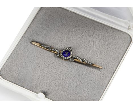A Russian yellow metal, enamel and diamond commemorative tie pin, with central blue enamel roundel, the figure 1 and OPT surr