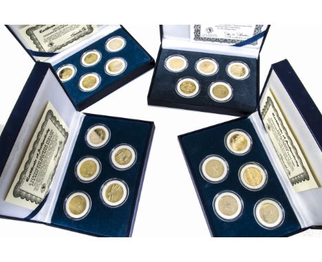 A set of 50 gold plated Statehood Quarter Dollars by Morgan Mint, from 2004, presented in ten blue boxes with certificates 