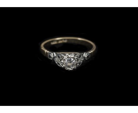 An art deco illusion set old cut diamond platinum and 18ct gold solitaire ring, ring size L 1/2, 2.4g 