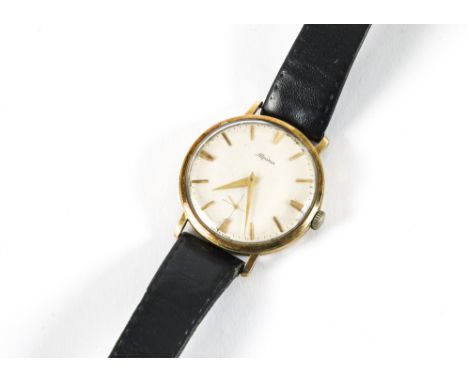 A vintage Alpina manual wind gentleman's wristwatch, 34mm circular case, not running, scratched to rear cover, on black strap