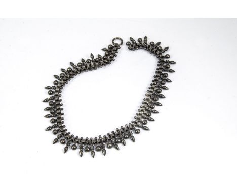 A Victorian white metal fringe necklace, the oval links alternately set with arrow and ball design apparently unmarked, 44 cm