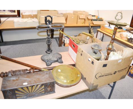 A cast iron stick stand, a group of copper and brass, oil lamps etc