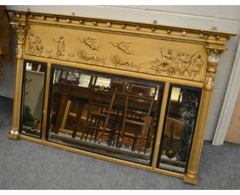 A Regency triple plate gilt framed overmantel mirror Overpainted. Loss of gesso to both columns and other places. Cracks to t