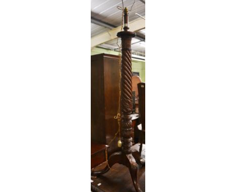 Early 20th century carved mahogany standard lamp with spiral turned column 
