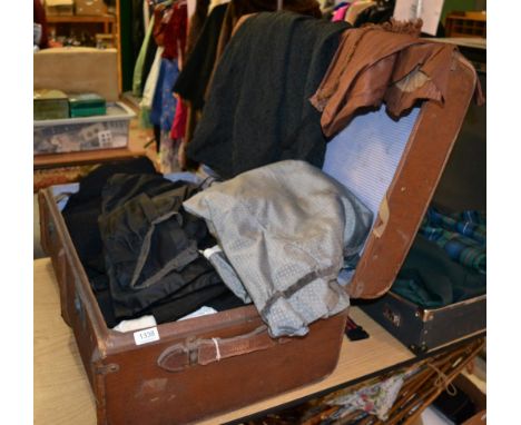 Travel trunk enclosing Victorian and later costume including a brown silk Victorian jacket, skirt and bustle, beaded cape, th