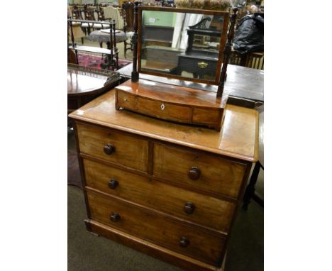 Victorian mahogany four drawer straight fronted chest of drawers; and a Regency mahogany bow fronted dressing table mirror 