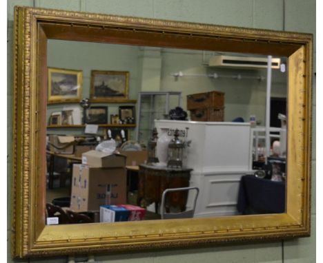 A gilt framed rectangular mirror 
