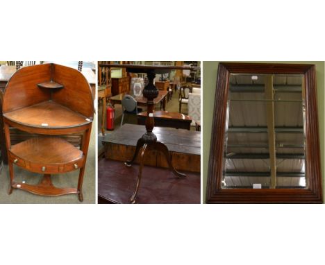 George III mahogany bow fronted washstand; a mahogany tripod table; and a walnut mirror with reeded frame (3) 