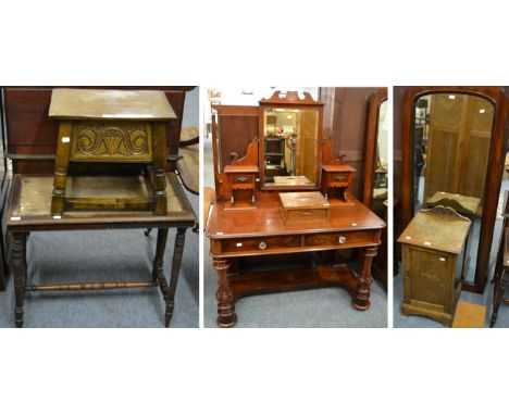 A 19th century mahogany dressing table, an early 20th century oak bedside cupboard, a 19th century mahogany mirrored wardrobe