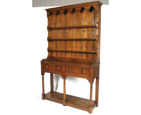 A modern oak kitchen dresser by R &amp; R Starling (Upton Cheney). The upper section with three shelves, panelled back and pe