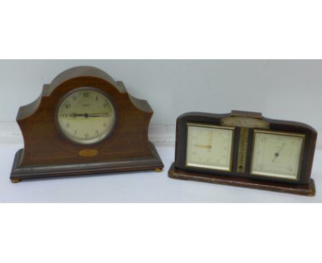 An eight-day clock with wooden inlay and a Smiths combined clock and barometer with inscription on a silver plaque