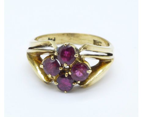 An 18ct gold, four ruby cluster ring, 5.7g, O