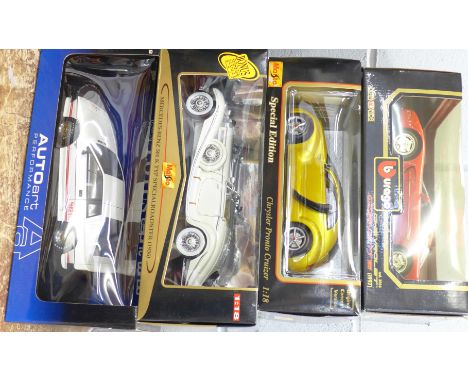 Four 1:18 scale model vehicles; two Maisto, Auto Art and one Burago, Mercedes-Benz 500K, Chrysler Pronto Cruzer, Lotus Esprit