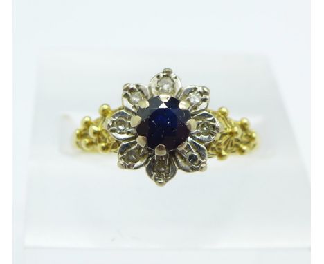 An 18ct gold and sapphire ring, 3g, R