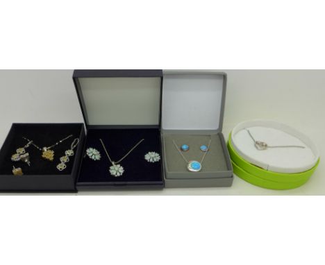 Silver jewellery including a silver and gold pendant and opal set