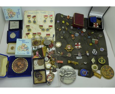 A large collection of badges, stickpins, lapel badges, awards, medals, etc. (120 items approximately) including silver WWII R