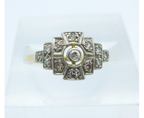 An 18ct gold, platinum set Art Deco diamond ring, 2.5g, O