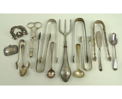 A collection of silver items, comprising a George IV silver 'Port' label, Birmingham 1797, John Turner, a pair of silver suga