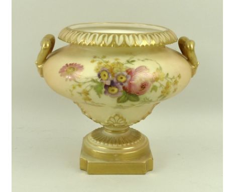 A Royal Worcester twin handled urn decorated with a spray of flowers, on square raised foot, registered number 301164 1960 an