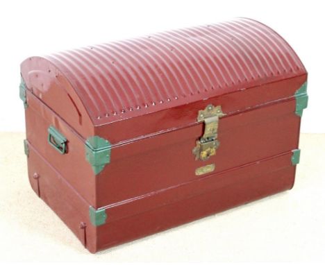 A 'Best Steel' dome top travelling trunk, painted red with brass handles and fittings, Jones Bros. & Co., Wolverhampton, 77 b