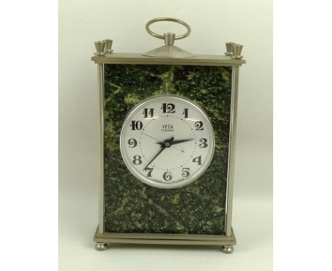 A Russian Molnija Vega mantel clock, early 20th century, with a green Serpentine stone body, set within brushed steel, made i