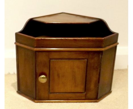 A small Victorian mahogany corner cupboard, single cupboard with brass knob, letter shelf above, 40 by 28 by 30cm high.
