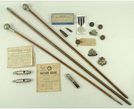 Militaria: a collection of items including two whistles, one marked ARP, three cap badges, including the Suffolk and East Sur