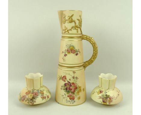 A pair of Worcester blush ivory twin handled squat urns,marked to base 991 and dated 1894, 8cm, together with a tall slender 
