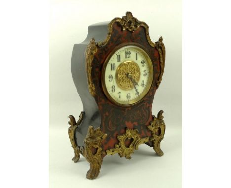 A Victorian French style mantel clock, with faux tortoiseshell and faux boullework decoration, Arabic numerals, and 8 day mov