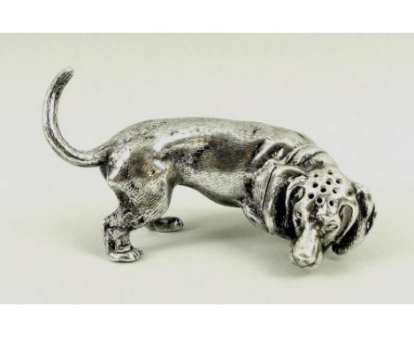 A Victorian silver pepperette in the form of a hunting dachshund, London 1899, WH for William Hornsby, 2.05toz, 7 by 4cm.