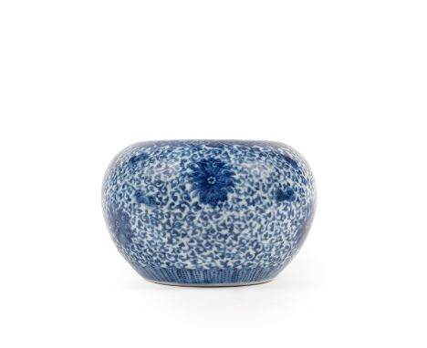 Globular in shape, it is decorated in blue underglaze with lotus scrolls; at the center of the base, it bears the six-charact