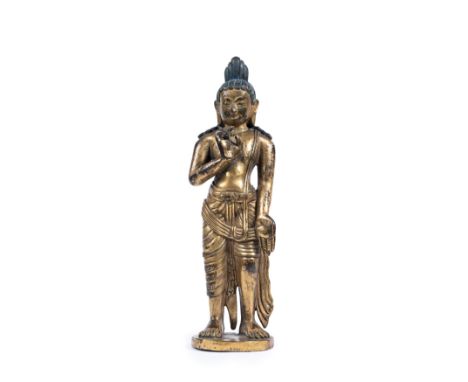 Possibly depicting the bodhisattva Avalokitesvara in a standing position, with the right hand in kataka mudra and the left lo