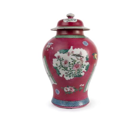 Jar with cover (once part of a five-piece garniture) with ruby-red as background, two opened calligraphy scrolls depicting fl