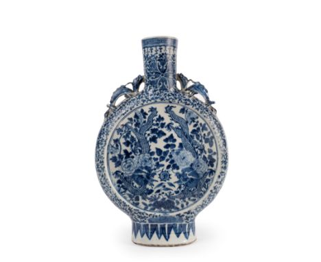 The blue and white "pilgrim flask" is finely painted in bright cobalt blue with two dragons playing with a pearl, surrounding